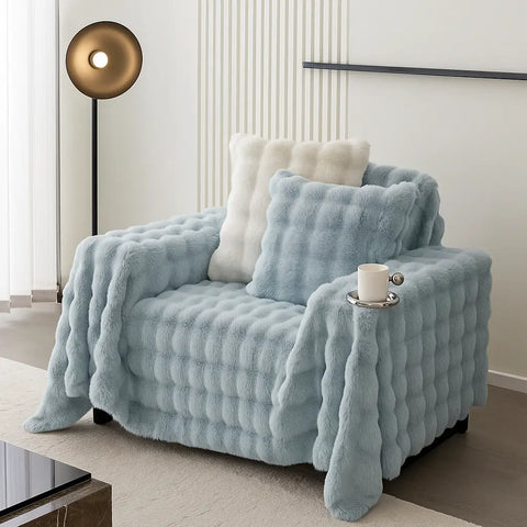 Cubre Sofá Piel de Conejo — Lujo suave que protege tu sofá.