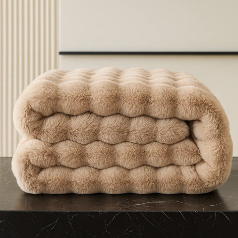 Cubre Sofá Piel de Conejo — Lujo suave que protege tu sofá.