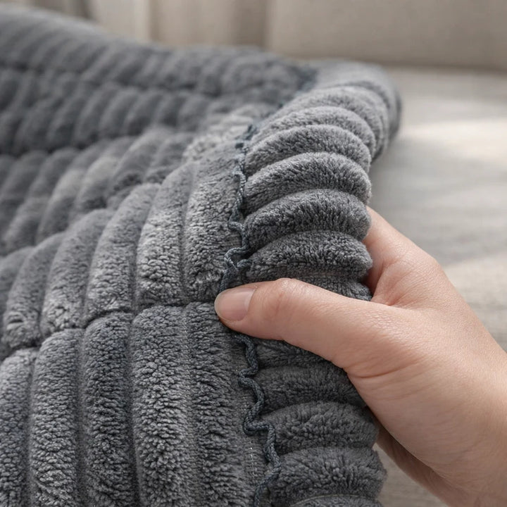 Textura plush acolchada del cubre sofá Majestuoso