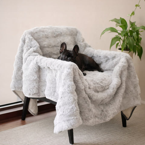 Cubre Sofá Piel de Conejo — Lujo suave que protege tu sofá.