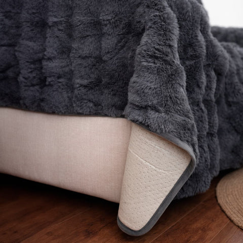 Cubre Sofá Piel de Conejo — Lujo suave que protege tu sofá.