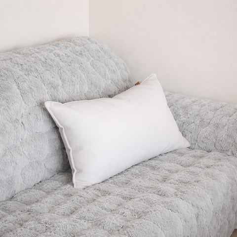 Cubre Sofá Piel de Conejo — Lujo suave que protege tu sofá.