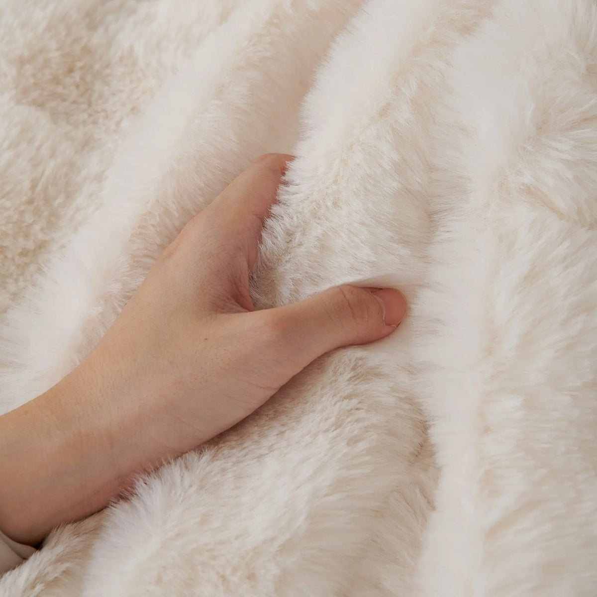 Cubre Sofá Piel de Conejo — Lujo suave que protege tu sofá